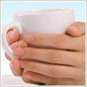 Hands Clasping a Cup